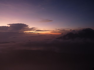 Beautiful sunrise on the volcano. View of Agung volcano from the peak of Batur. Indonesia, Bali.