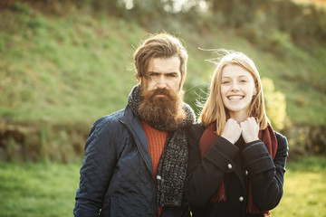Fototapeta premium Young couple in autumn park