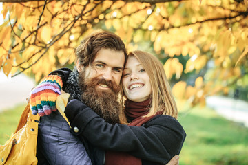 Young couple in autumn park