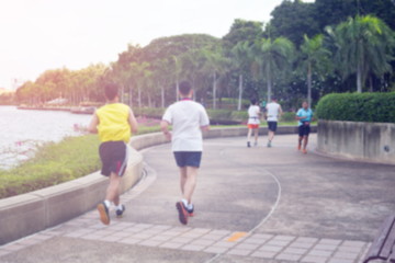 Blurred or De-focus man jogging in the park with gradient effect,Fitness concept.