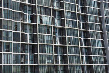 Buildings pattern photo : Condo windows and balconies viewed