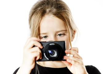 Cute little girl with compact digital camera