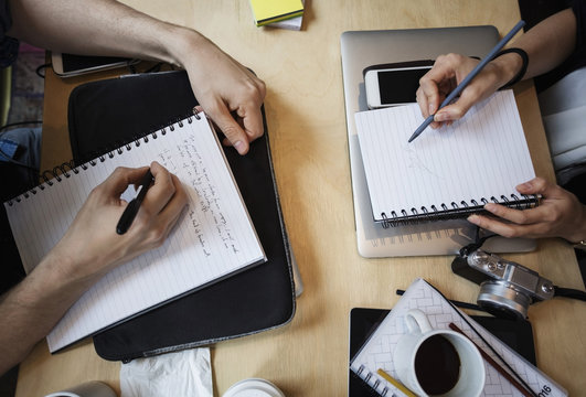 High angle shot of business people working in the office