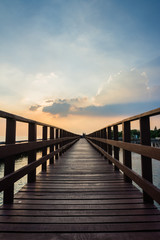 Obraz premium Wooden beach walkway in the evening, a nature trail in Bangkok, Thailand.
