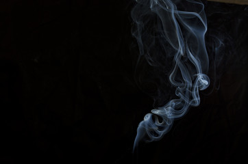 Incense Smoke on Black Background