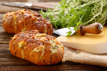 Homemade fresh bread stuffed cheese and garlic with herbs