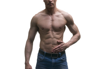 Muscular middle-aged man posing on white background, isolated studio shot