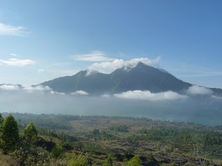 Beautiful sunrise on the volcano. View of Agung volcano from the peak of Batur. Indonesia, Bali.