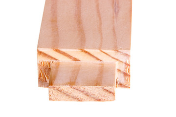 Close-up of a board with a woodworking tenon isolated