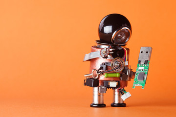 Robot with usb flash storage stick. Data storing and robotic technology concept, fun toy character...