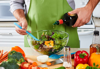 Chef man cooking in the kitchen.