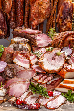 Still life of various smoked pork meat