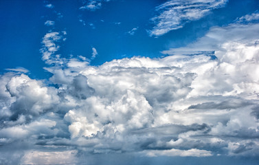 clouds in the blue sky in summer