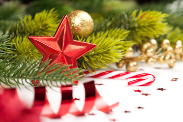 Christmas star and other decoration on tree