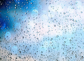 Naklejka na ściany i meble Abstract raindrops on glass and lights , Raindrops on the window 