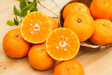 Fresh oranges on wooden table. Group of Fresh Orange on Wood Table Desk Background