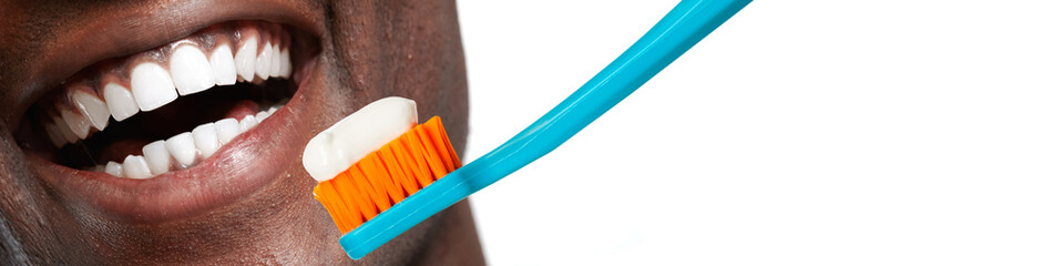 Mouth with toothbrush.