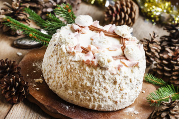 Obraz na płótnie Canvas Cake of the whipped egg white, Christmas decorations, selective
