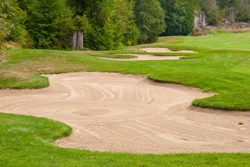 Golf place with nice green and bunkers.