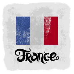 France. Abstract grunge vector background with lettering and flag
