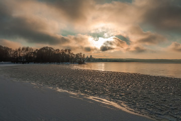 Three types of ice - thick under snow, the frozen fragments and transparent thin against the...