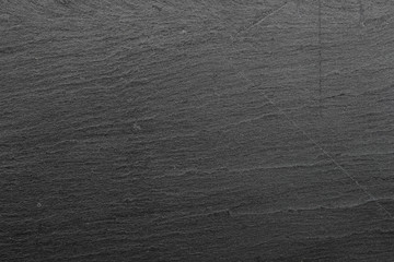 Dark grey black slate background or texture. © jamroenjaiman