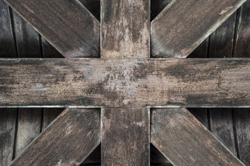 Wooden cross roof from inside desaturated