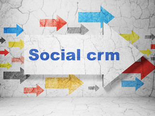 Marketing concept: arrow with Social CRM on grunge wall background