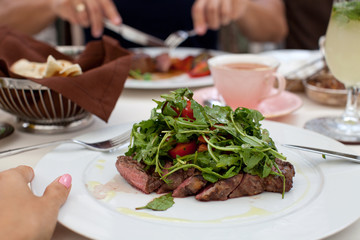 Hot Meat Dishes-Fillet of beef with rucola.