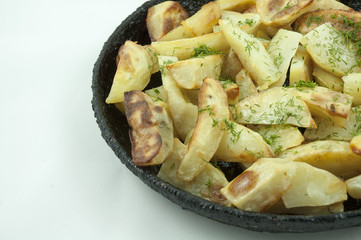Potato wedges in the pan