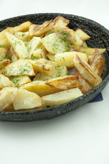 Potato wedges in the pan