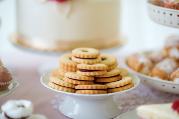 Close up, sandwich cookies filled with jam. Studio shot.