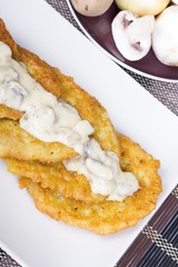 potato pancakes with mushroom sauce
