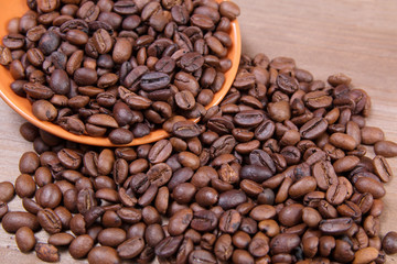 coffee beans in an orange plate