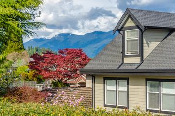 Luxury house in Vancouver, Canada against blue sky