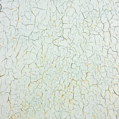 Detail of cracked paint on wall.
