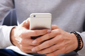 hands with mobile phone