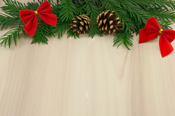 red bows and cones on the tree