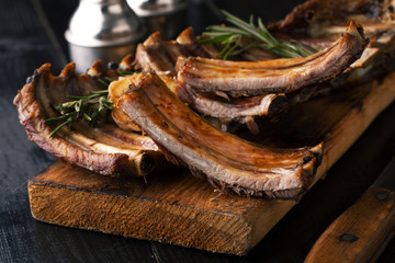 Grilled pork ribs with herbs, spices and rosemary