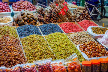 Raisins for sale at night market, Dunhuang, China