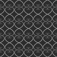 Seamless pattern of dots on a gray background.
