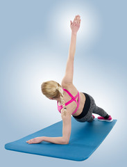 Woman exercising with yoga