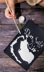 Little girl writes letter to Santa