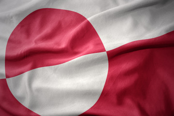 waving colorful flag of greenland. © luzitanija