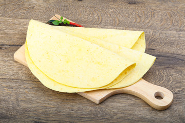 Tortilla on the wood background