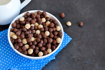 Healthy breakfast. Chocolate breakfast cereal with milk 