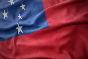 waving colorful flag of Samoa.