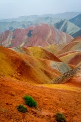 Rugzak Rainbow mountains, Zhangye Danxia geopark, China © dinozzaver