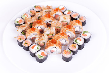 Japanese food restaurant, sushi maki gunkan roll plate or platter set. California  rolls with salmon.  isolated at white background. Top view, flat lay.