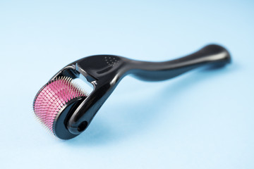 Obraz premium Derma roller for medical micro needling therapy. Tool also known as: Derma roller, mesoroller, meso-roller, mesopen.